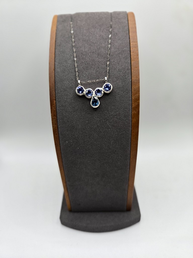 Sterling Silver Pendant set with four 5mm No Heat Tanzanite and 0.65ct No Heat Pear Tanzanite